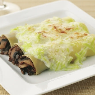 Überbackene Cannelloni mit Champignons, Oliven und Lauch