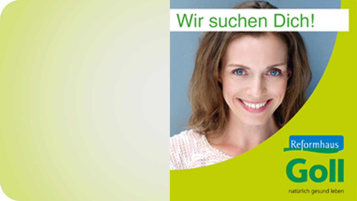 Mitarbeiterin lacht in die Kamera